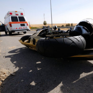 motorcycle crash with ambulance